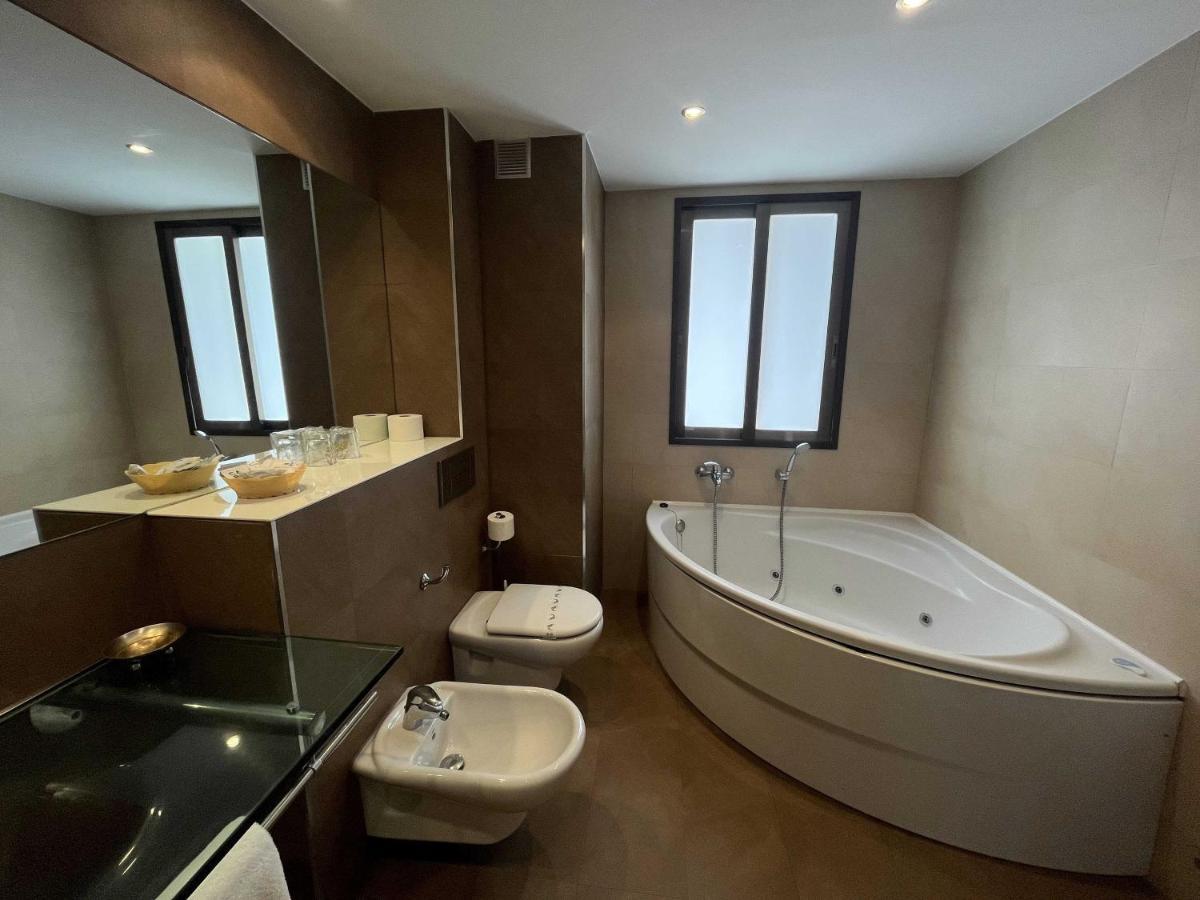 Apartamentos Astuy Isla Bagian luar foto