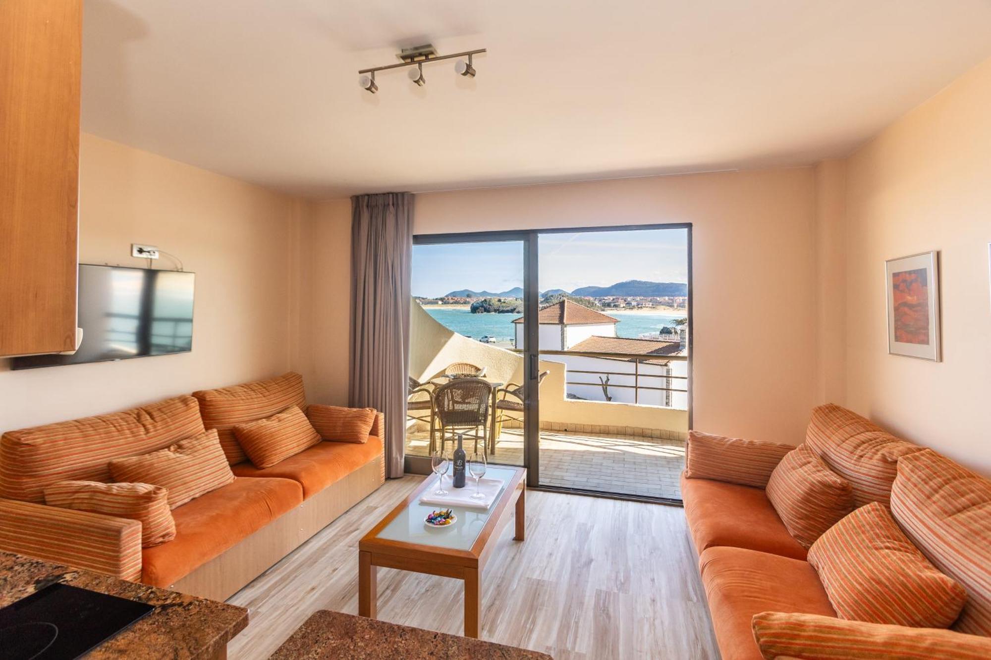 Apartamentos Astuy Isla Bagian luar foto