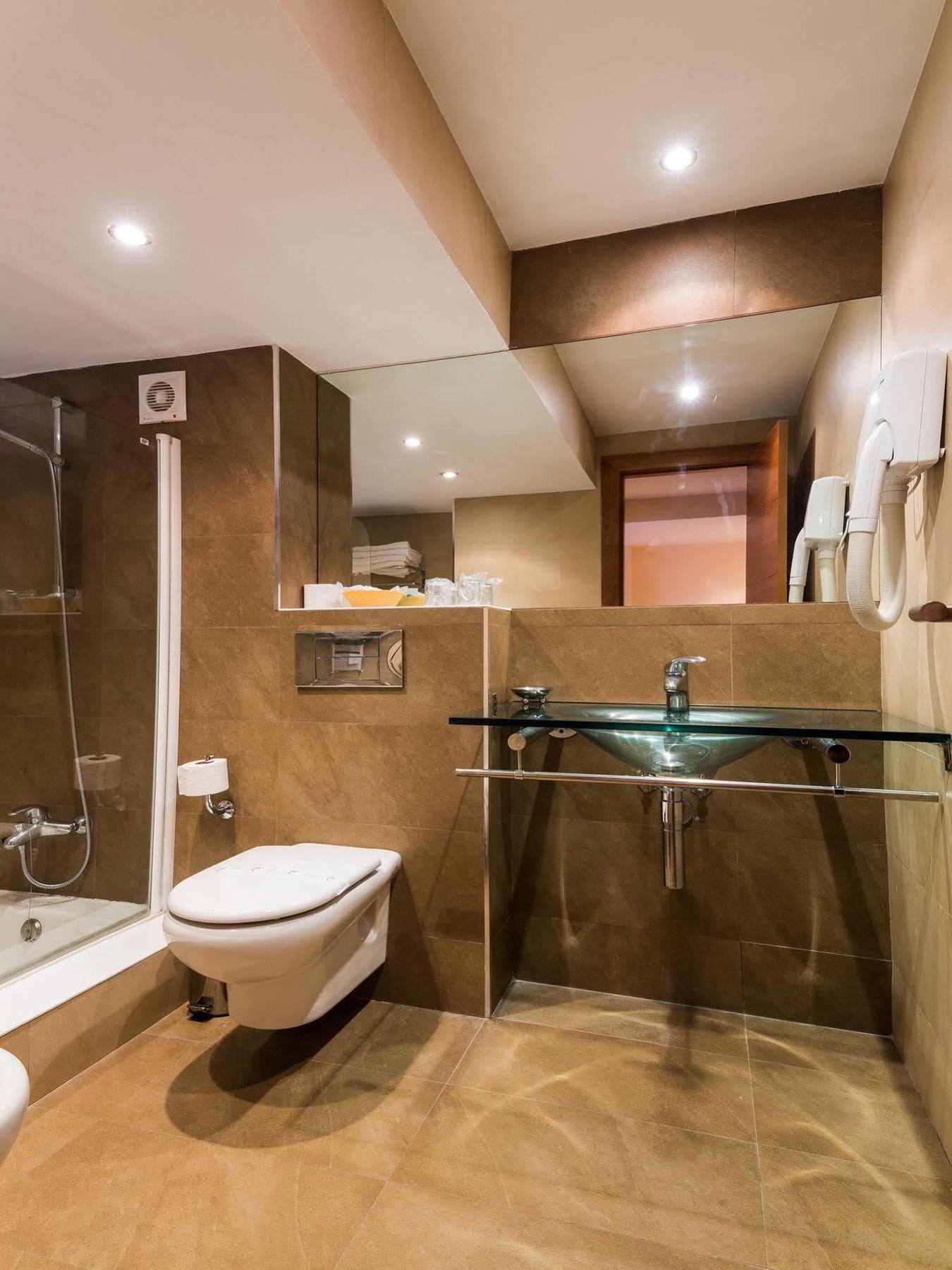 Apartamentos Astuy Isla Bagian luar foto